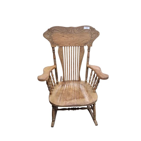 Antique pressback rocking chair with extra wide seat, 40" tall