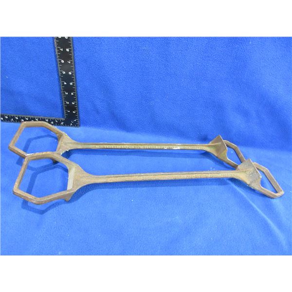 2 Dr. Rinehart Cast Iron Handy Hog Holders - Patented 1931