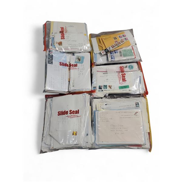 6 Bags of Cancelled North American Stamps on Envelopes