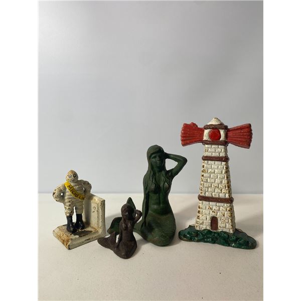Cast Iron Figurine Group “ Michelin, Mermaids, and Lighthouse