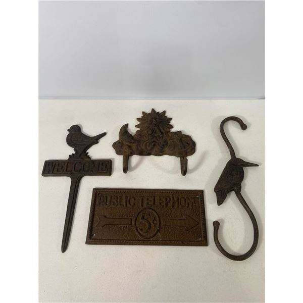Cast Iron Decorative Lot: Sun Face Hook, Bird Hooks, and Telephone Sign