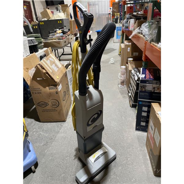 ProTeam ProForce 1500XP dual-motor, upright vacuum cleaner with a hose and auxiliary tools