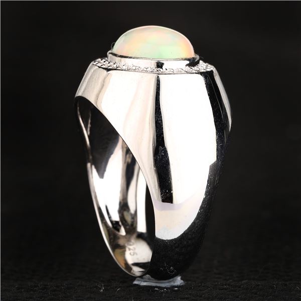 $150 stamped 925 4.99g, 1.90ct opal & zirconia ring
