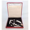 Image 1 : PRAYER CIRCLE NECKLACE 2004 STRAND OF PEARLS &