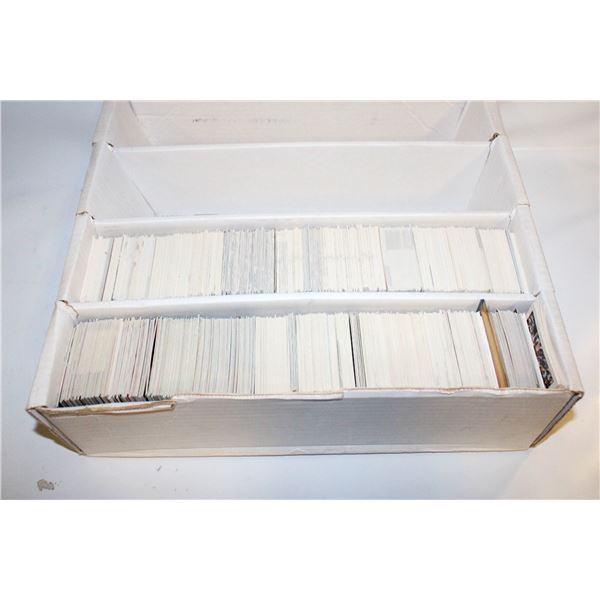 BOX WITH 2 ROWS OF NFL FOOTBALL CARDS