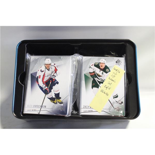 TIN FULL OF OPENED CARDS