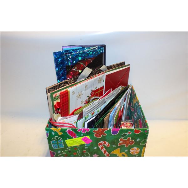 BOX OF OVER 15 CHRISTMAS BAGS/ROLL OF STICKERS