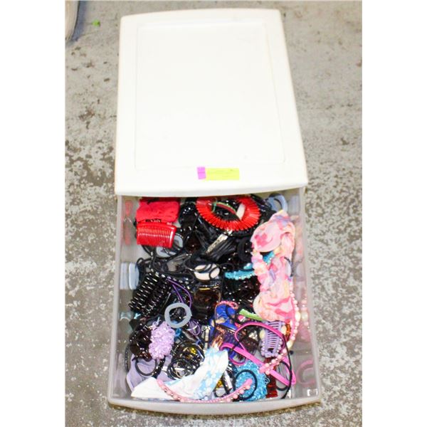 BIN FILLED WITH HAIR ITEMS