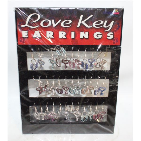 LOT OF 18 EARRINGS ON DISPLAY