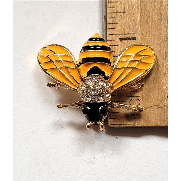 10)  GOLD TONE WITH YELLOW AND BLACK