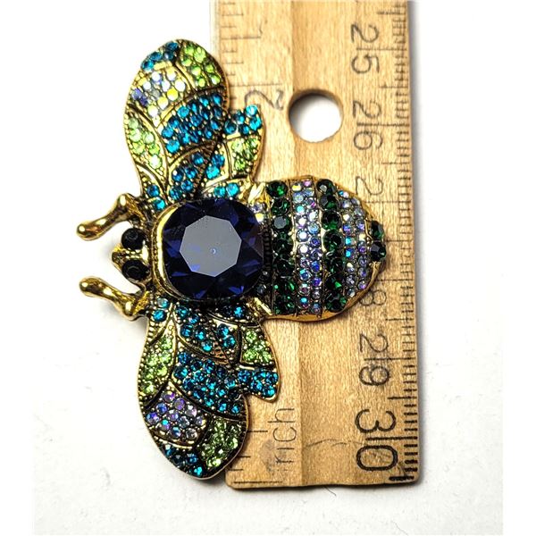 7)  GOLD TONE WITH MULTI COLORED (BLUE,