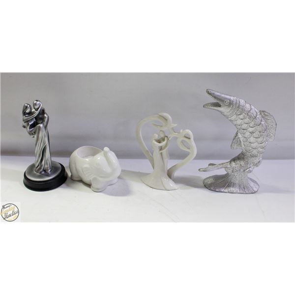 WHITE CERANIC ELEPHANT CANDLE HOLDER.