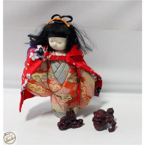 1 JAPANESE DOLL. 1 MINI DRAGON STATUE