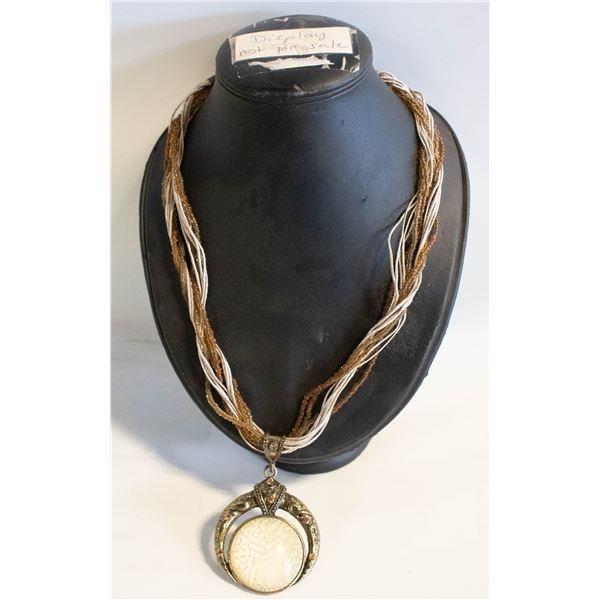 LADIES WOVEN STRING NECKLACE WITH EXOTIC PENDANT