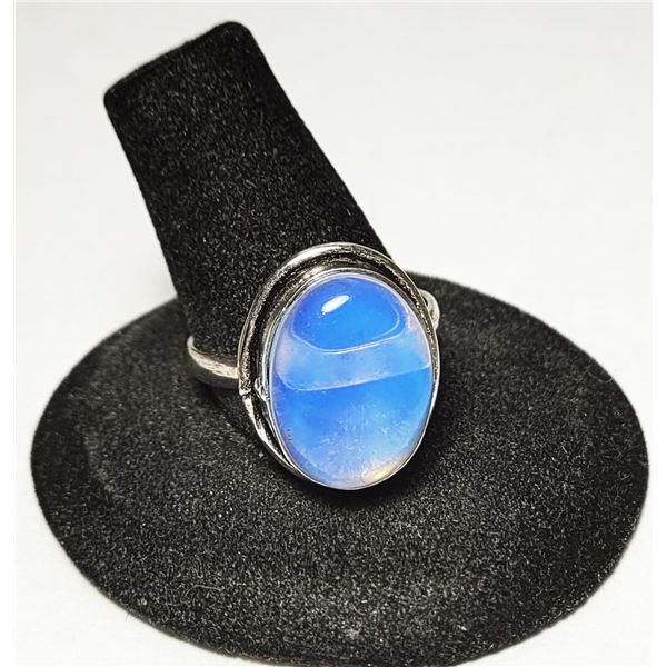 13)  NATURAL OVAL BEZEL SETTING STAMPED