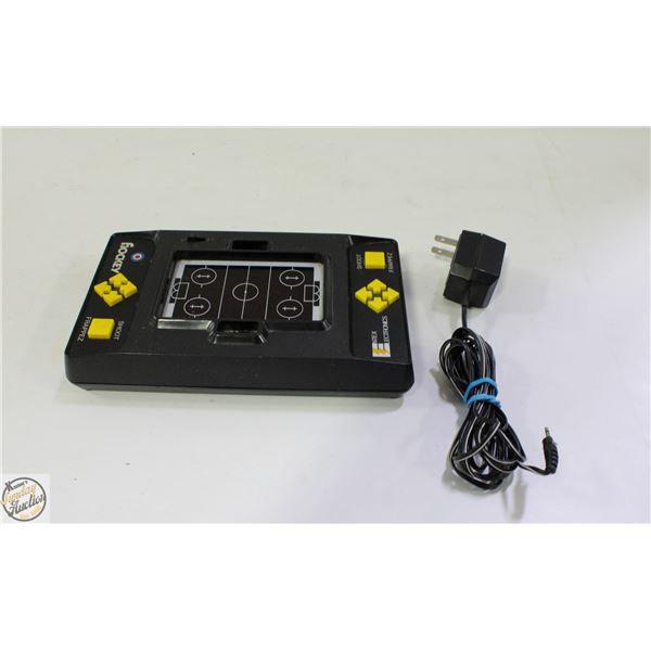 1979 HOCKEY GAME WITH CORD