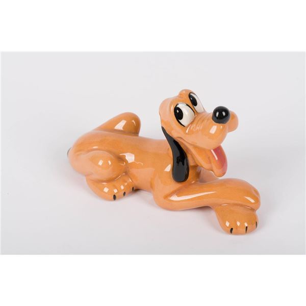 A Ceramic Pluto Figurine by Shaw Pottery.