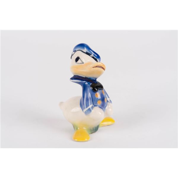 A Donald Duck Ceramic Figurine by Evan K. Shaw Pottery.
