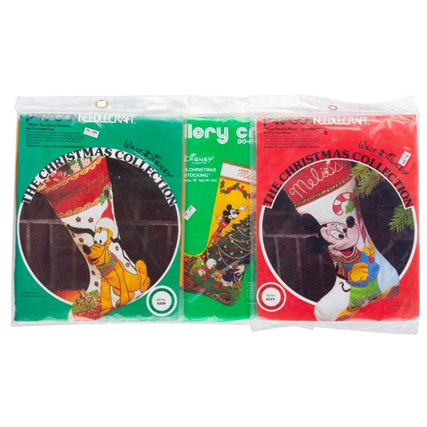A Trio of Mickey and Friends Stocking Needlecraft Kits.