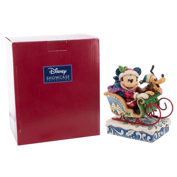 A Jim Shore"Laughing All the Way" Figurine.