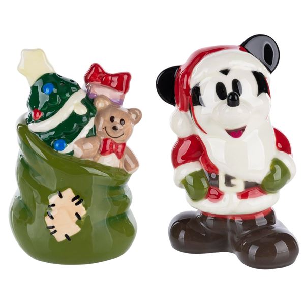 A Pair of Santa Mickey Salt and Pepper Shakers.