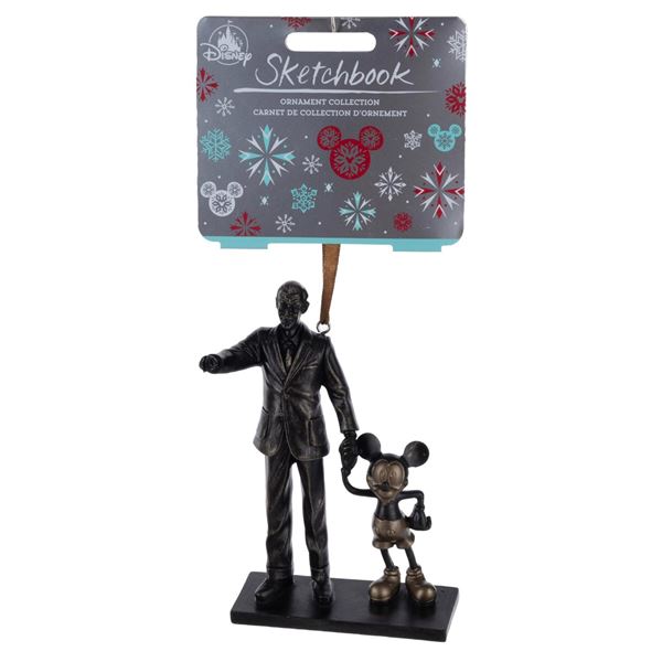 A Walt and Mickey"Partners" Sketchbook Christmas Ornament.