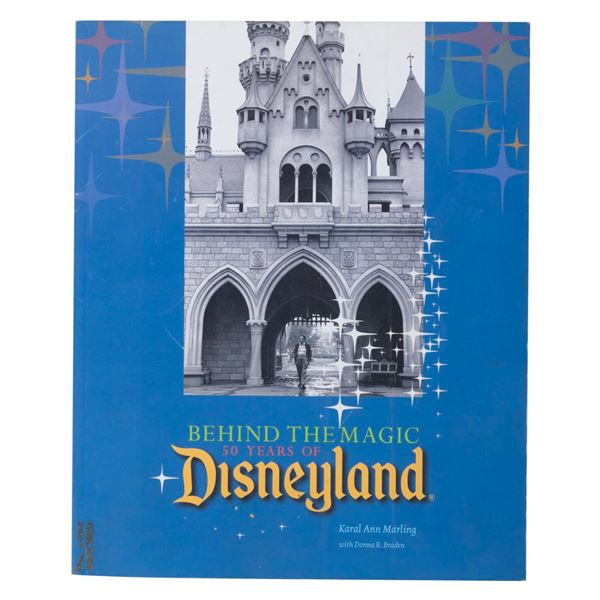 A Behind the Magic: 50 Years of Disneyland Book.