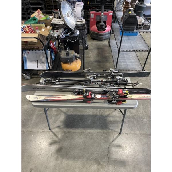 3 PAIRS OF SKIS AND 2 SETS OF POLES