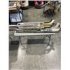 Image 1 : LOT ICE AND FLOOR HOCKEY STICKS