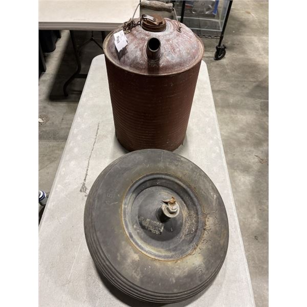 SPARE TIRE AND METAL JERRY CAN