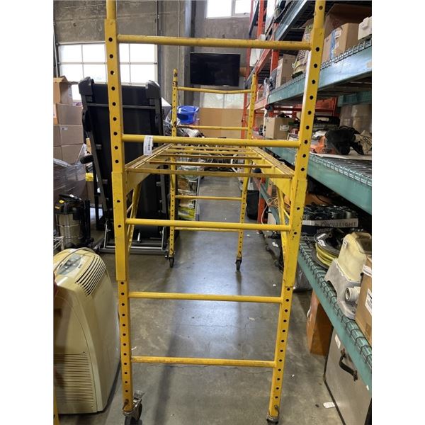 YELLOW ROLLING SCAFFOLD SECTION, 29 X 74 INCH, HAS DECKING FRAME NO WOOD