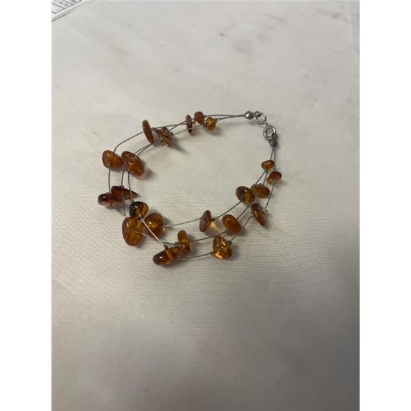 VINTAGE TRIPLE STRAND BRACELET W/ NATURAL BALTIC AMBER BEADS