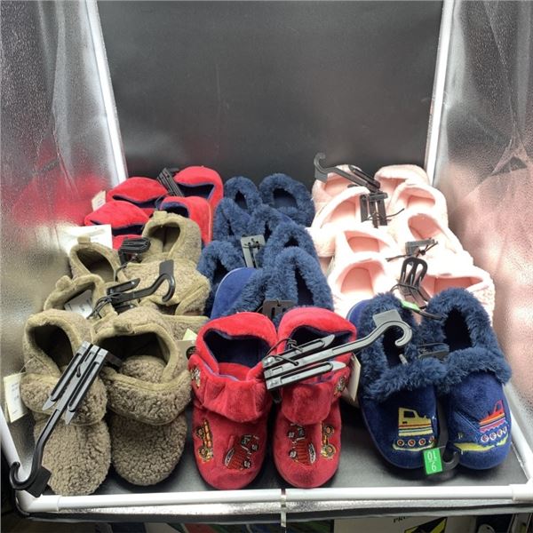 LOT OF NEW CHILD SIZE SLIPPERS AND FOOTWEAR