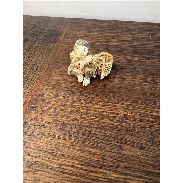 Netsuki signed one piece carved