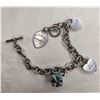 Image 1 : Tiffany & Co. SS charm bracelet with three charms