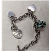 Image 2 : Tiffany & Co. SS charm bracelet with three charms