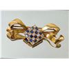 Image 1 : Art Deco 18k yellow gold Bow Brooch with diamonds and sapphires