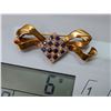 Image 3 : Art Deco 18k yellow gold Bow Brooch with diamonds and sapphires