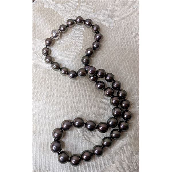 Mikimoto 18" (?) strand of graduated black pearls necklace