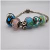 Image 2 : PANDORA bracelet with 7 charms, marked 925