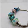 Image 4 : PANDORA bracelet with 7 charms, marked 925