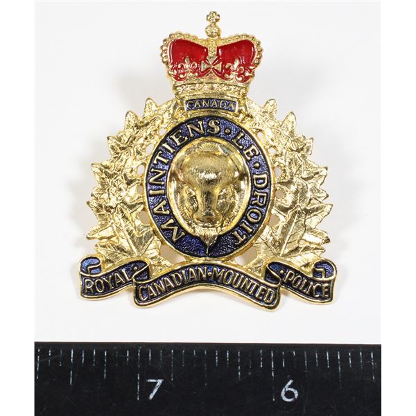 #194 1980S ROYAL CANADIAN MOUNTED POLICE CAP BADGE
