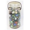 Image 1 : VINTAGE CANADA GLASS JAR FULL OF MARBLES
