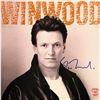 Image 1 : Steve Winwood signed "Roll With It" album
