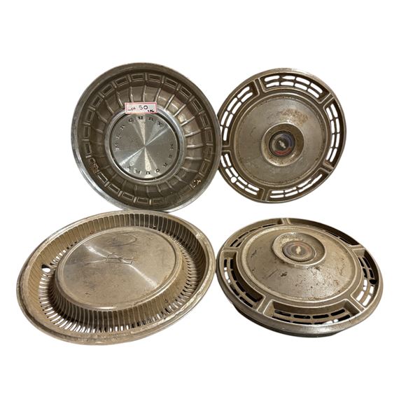 Group of assorted vintage hubcaps (Mercury, Oldsmobile etc)