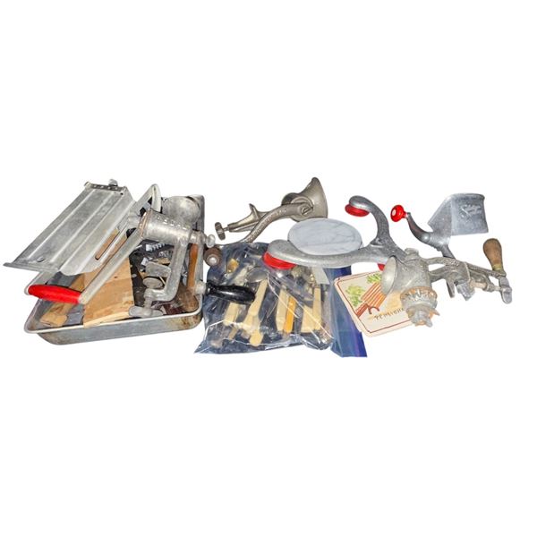 Shelf of assorted vintage kitchen tools - includes hand crank grinders / utensils / meat tenderizer 