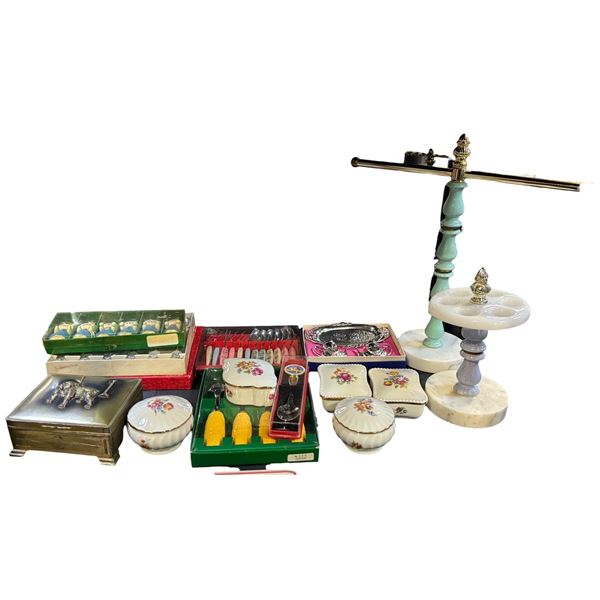 Shelf of assorted trinkets / cutlery sets / marble toothbrush holder etc