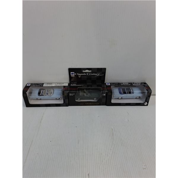 (3) In Box Die-Cast Vehicles (Cadillac, Mustang, C300)
