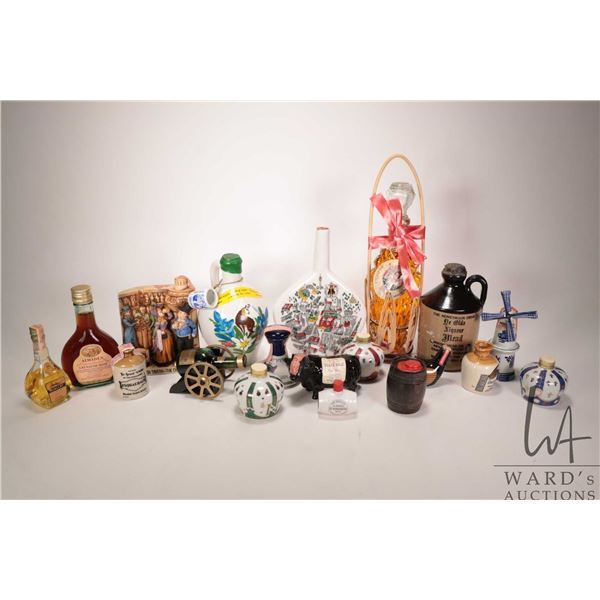 Selection of bar collectibles including full and partially full bottles, assorted liquors and liqueu