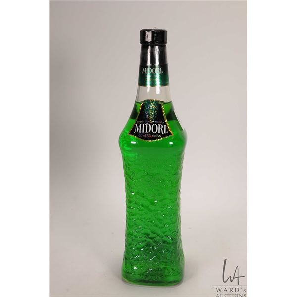 Midori/ Melon Liquor/ 750ml/ 20% ABV Note: Alcohol cannot be insured by any courier in Canada. Local